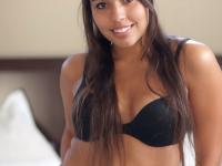 Latina female sports a smile on her pretty face while modeling in lingerie - Photo #2