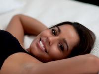 Latina female sports a smile on her pretty face while modeling in lingerie - Photo #6