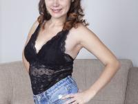 Cute amateur girl Sharon Rosie shows her petite figure and bushy clam - Photo #1