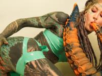 Body modifier Anuskatzz sticks a big dildo into her anal cavity - Photo #11