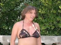 Curvy mature model named Molly shows her big round ass outdoors - Photo #1