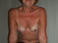 Mature amateur Lisa shows her cute boobs and poses in shiny stockings - Photo #10