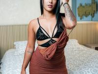 Tattooed brunette flashes naked before riding her guy's cock - Photo #4