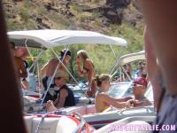Blonde amateur Naughty Allie engages in lesbian play during a boat party - Photo #7