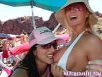Blonde amateur Naughty Allie engages in lesbian play during a boat party - Photo #13