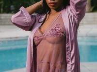 Beautiful black babe Selene teases with her big boobs while naked outdoors - Photo #1
