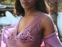 Beautiful black babe Selene teases with her big boobs while naked outdoors - Photo #4