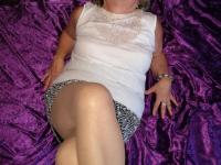 Horny aged lady sniffs her panties before sliding hand down hose to masturbate - Photo #3
