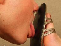 Russian chick has her naked slave boy worship her heels and bare feet too - Photo #9