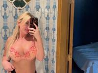 Sultry blonde takes self shots while sporting a strapon cock - Photo #3