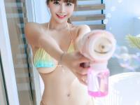 Sexy Asian model uncovers her lovely big tits and round ass in a tub - Photo #2
