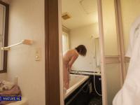 Horny Japanese MILF Minayo blows a teen boy and rides his stiff dick - Photo #2