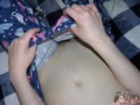 Young amateur shows her bald pussy and asshole while getting totally naked - Photo #8