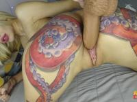 Blonde slut Telari Love shows off her tattooed ass and toys her shaved pussy - Photo #10