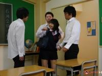 Japanese student Tomoyo Isumi receives facial cumshots in a classroom - Photo #1