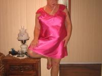 Silver haired nan Girdle Goddess pulls her hose down around her knees on a bed - Photo #2