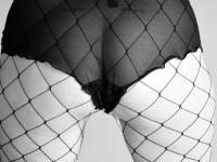 Old woman with short hair and floppy tits dons a strapon in fishnet pantyhose - Photo #12