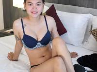 Attractive Asian Sprite strips and shows her big tits & pussy at a casting - Photo #6