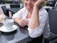 Far grandmother Caro flashes pubic hairs that escape her upskirt underwear - Photo #1