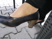Far grandmother Caro flashes pubic hairs that escape her upskirt underwear - Photo #2