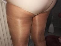 Far grandmother Caro flashes pubic hairs that escape her upskirt underwear - Photo #4