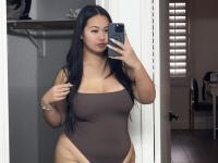 Solo model with long dark hair poses in outdoor swimwear and sexy lingerie - Photo #6