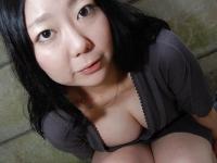 Well-stacked asian lassie undressing and exposing her juicy twat in close up - Photo #3