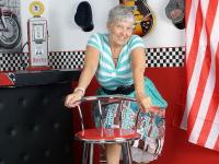 Old American lady Savana exposes her big butt in basement bar - Photo #5