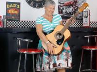 Old American lady Savana exposes her big butt in basement bar - Photo #16