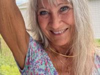 Skinny blonde granny Leilani toys her shaved pussy using a glass dildo - Photo #1