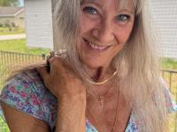 Skinny blonde granny Leilani toys her shaved pussy using a glass dildo - Photo #2