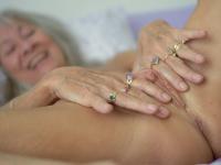 Skinny blonde granny Leilani toys her shaved pussy using a glass dildo - Photo #13