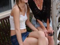 Lewd mature lady picks up a slutty teen and has some lesbian fun in the car - Photo #2