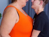 Chubby granny Babet lets her young lover lick her shaved pussy before sex - Photo #1
