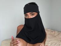 Solo girl models non-nude in black lingerie and with a hijab - Photo #1