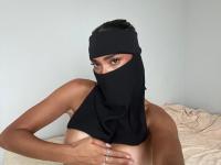 Solo girl models non-nude in black lingerie and with a hijab - Photo #2