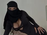 Solo girl models non-nude in black lingerie and with a hijab - Photo #17