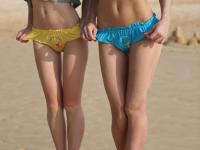 Toned beach babe Mayer and her sexy friend flaunt their hot asses in the sand - Photo #12