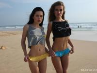 Toned beach babe Mayer and her sexy friend flaunt their hot asses in the sand - Photo #15
