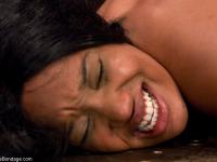 Ebony babe Kapri Styles endures rough doggystyle sex in metal bondage - Photo #9