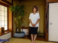 Asian granny Asami Fujiwara strips and facesits a guy on the floor - Photo #3