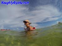 Big titted amateur lounges on an air mattress while naked in a ball cap - Photo #7