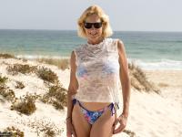 Mature blonde Molly MILF strips totally naked on a sandy beach - Photo #6