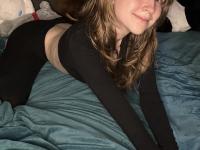 Sweet teen with a gap in her front teeth shows her underwear on a bed - Photo #2