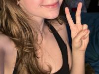 Sweet teen with a gap in her front teeth shows her underwear on a bed - Photo #7