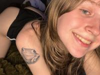 Sweet teen with a gap in her front teeth shows her underwear on a bed - Photo #9