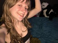 Sweet teen with a gap in her front teeth shows her underwear on a bed - Photo #11
