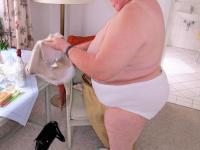 Chubby granny Marie Theres shows her big saggy tits & ass while changing - Photo #2