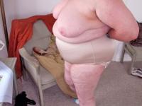 Chubby granny Marie Theres shows her big saggy tits & ass while changing - Photo #3