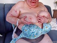 Chubby granny Marie Theres shows her big saggy tits & ass while changing - Photo #6